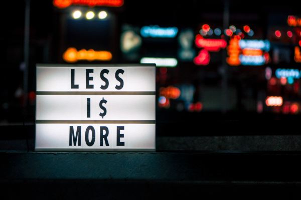 Sign saying "Less is More"